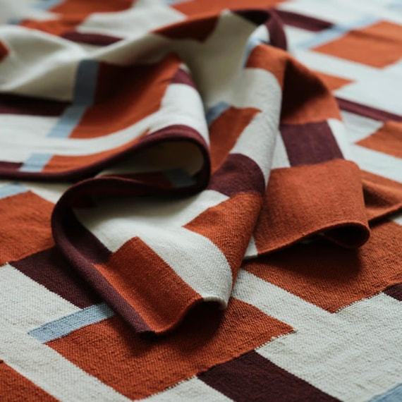Geometric Wool Kilim Rug: Brown, Blue, and White