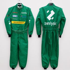 Custom promotional racing suits for companies, teams, and events with personalized brand logos, company name, staff name, number, flag, and sponsor-style graphics. Fully customized motorsport jumpsuits designed for corporate branding, business promotion, team uniforms, trade shows, racing events, and marketing campaigns. Your brand, your suit concept for kids and adults.