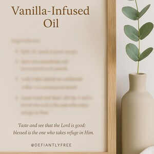 May include: A framed print with the text "Vanilla-Infused Oil" in a brown font. Below the title is a list of ingredients. The bottom of the print reads "Taste and see that the Lord is good: blessed is the one who takes refuge in Him."