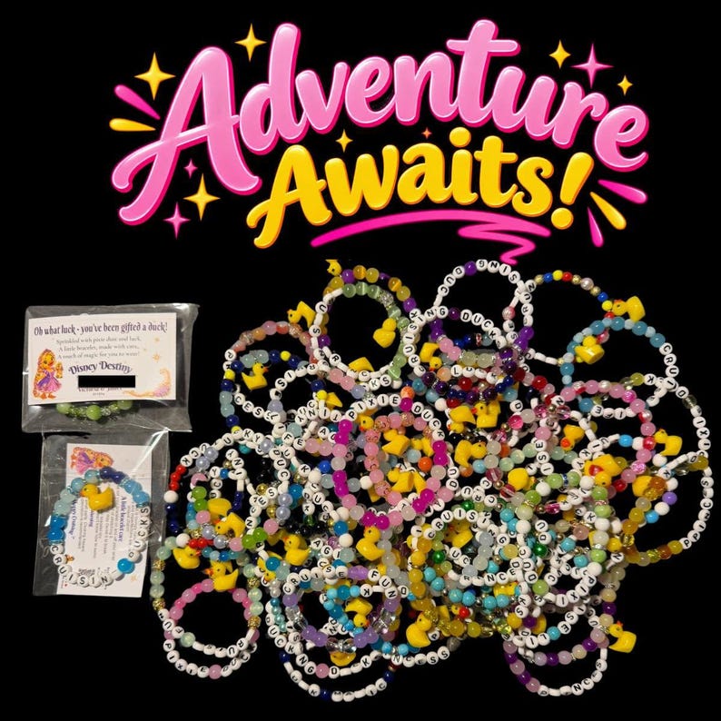 May include: A collection of colorful beaded bracelets featuring small yellow rubber duck charms and letter beads spelling out phrases like Cruising Duck. Two bracelets are individually packaged in clear plastic bags with cards.