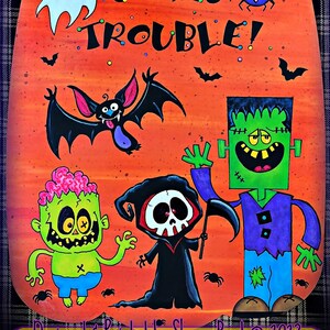 May include: A Halloween-themed pumpkin-shaped sign with the text "Here Comes Trouble!" painted in black. The sign features a variety of cartoon characters including a ghost, a bat, a spider, a zombie, Frankenstein, and the Grim Reaper. The background is orange with black polka dots.