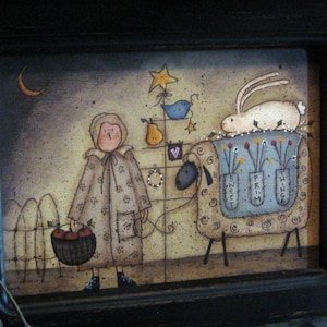 May include: A primitive folk art painting of a girl holding a basket of apples, a sheep with flowers in pots on its back, and a white rabbit. The painting has a rustic, whimsical style with a brown background and a blue sky.