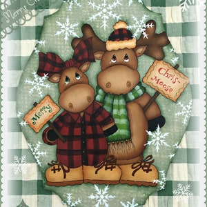 May include: Two moose wearing plaid and a green scarf, holding signs that say "Merry" and "Chris-Moose". The moose are standing on a green and white checkered background with snowflakes.