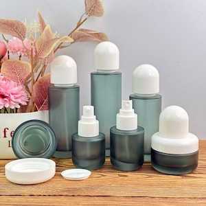 Flacons cosmétiques de luxe en verre dépoli vert, Flacon pompe de lotion, Flacon pulvérisateur et pot de crème, Emballage de soin de la peau rechargeable, Atomiseur en verre
