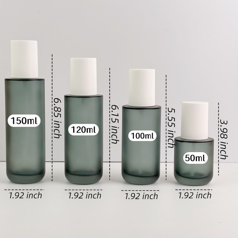May include: Four grey glass bottles with white caps, labelled 150ml, 120ml, 100ml, and 50ml. The bottles are 4.88 cm wide and range in height from 10.11 cm to 17.40 cm.