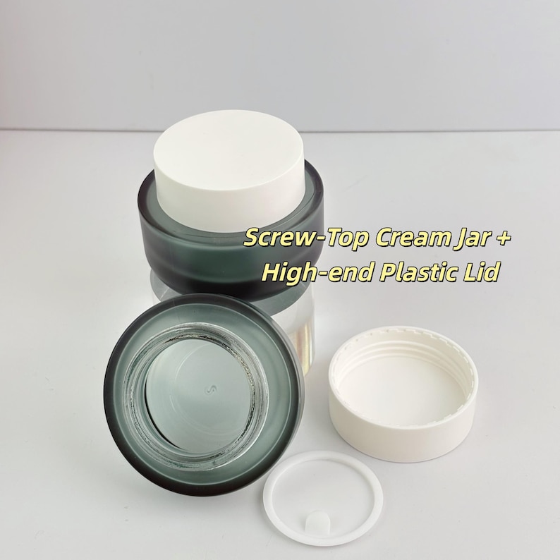May include: A set of screw-top cream jars with high-end plastic lids. The jars are a dark teal colour with white lids. The text "Screw-Top Cream Jar + High-end Plastic Lid" is visible in the image.