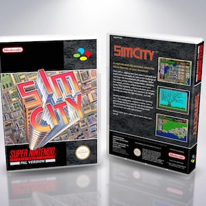 May include: A Super Nintendo SimCity video game box. The front features the game's title in a 3D style over a city graphic. The back shows gameplay screenshots and game details. The box is labeled as PAL Version.