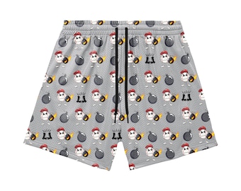 May include: Gray mesh shorts with a repeating pattern of cartoon baseballs wearing red hats and holding lit bombs. The shorts have a drawstring waistband and a relaxed fit, perfect for casual wear.