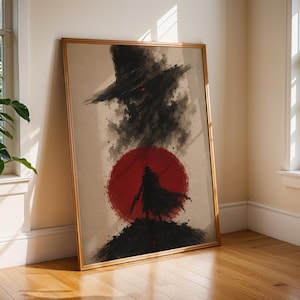May include: A framed rectangular wall art print featuring a dark, stylized illustration of a figure in a long coat and wide-brimmed hat standing before a large, solid red circle. The artwork uses black ink-wash textures and a beige background.