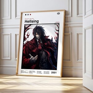May include: A framed poster featuring artwork from the anime series Hellsing. The image depicts a character in a red coat with dark hair. The poster is leaning against a white wall and wooden floor.