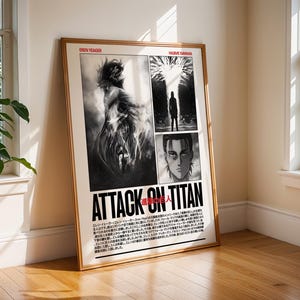 May include: A framed poster with manga illustrations from "Attack on Titan." The poster, in a wooden frame, showcases black and white artwork of characters and scenes. The title "ATTACK ON TITAN" is boldly printed across the bottom.