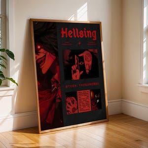 May include: A framed poster with the title "Hellsing" in red, featuring a red and black anime-style illustration. The poster includes Japanese text and a gold frame. The artwork is leaning against a wall near a window.