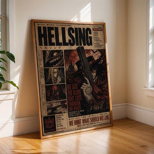 May include: A rectangular Hellsing anime poster in a gold frame featuring dark, gothic illustrations of characters, a large handgun, and text including 'HELLSING', 'WE ARE THE BLADE THAT CUTS THROUGH THE NIGHT', and 'WE HUNT WHAT SHOULD NOT LIVE'.