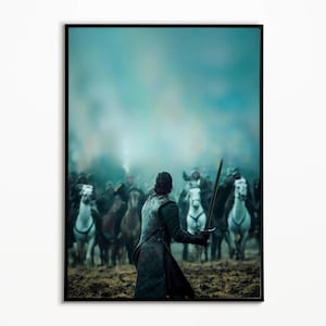 Può includere: Stampa incorniciata raffigurante una scena di battaglia. Una figura con una spada affronta un esercito a cavallo. L'opera d'arte presenta una tavolozza di colori scuri, evidenziando la figura centrale e i cavalli.