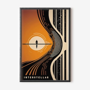 May include: Framed art print with a minimalist design in orange and black. The artwork shows a silhouetted figure on a line, with a circular sun and the word "INTERSTELLAR" at the bottom. The print is in a black frame.