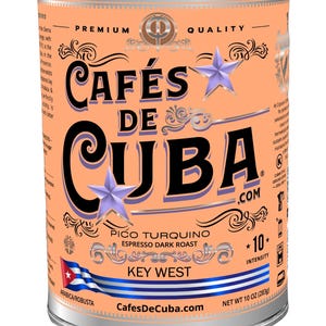 May include: A cylindrical can of Cafés de Cuba coffee. The can is peach-colored with black text and two purple stars. The text includes "Pico Turquino Espresso Dark Roast" and "Key West." The net weight is 10 oz (283g).