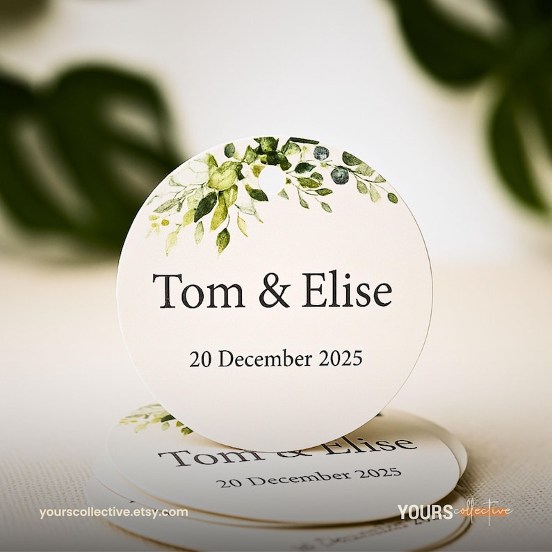 May include: Round white wedding favor tags with green and yellow floral accents. The tags read "Tom & Elise" and "20 December 2025". The Etsy shop URL "yourscollective.etsy.com" is printed on the bottom of the tag.