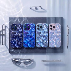 May include: Four smartphone cases arranged in a row, each featuring a three-dimensional liquid metal texture. The colors transition from deep navy blue on the left to a light, iridescent pastel pink on the right, with metallic highlights throughout.