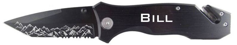May include: Black pocket knife with a serrated blade and a mountain scene etched into the handle. The knife has a safety feature and a belt clip. The handle is engraved with the name "BILL".