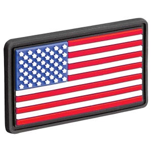 May include: A rectangular patch featuring the American flag. The flag design includes red and white stripes, a blue canton with white stars, and a black border. The patch is a patriotic emblem.