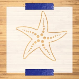 May include: A white stencil of a starfish with a dotted pattern. The stencil is on a wood background.