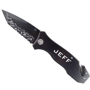 May include: Black pocket knife with a serrated blade and a safety feature. The knife has a mountain range design on the blade and the name "JEFF" engraved on the handle.
