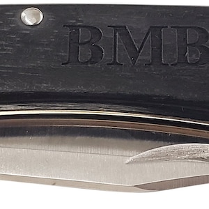 Engraved Buck Folding Hunter With Brass Bolsters & Sheath - Traditional