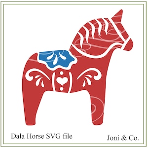 May include: A red and blue Dala horse, a traditional Swedish folk art wooden horse, with white painted details. The horse has a heart shape on its side and a blue saddle.