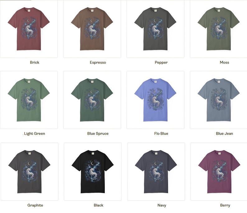 May include: A collection of twelve short-sleeve t-shirts in various colors including brick, espresso, pepper, moss, light green, blue spruce, flo blue, blue jean, graphite, black, navy, and berry, each featuring a graphic of a unicorn and moon.