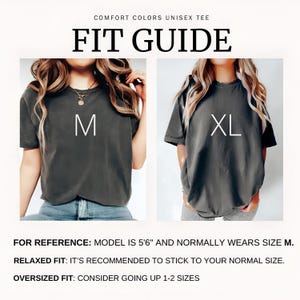 May include: A Comfort Colors unisex t-shirt fit guide featuring two charcoal grey shirts labeled M and XL. Text includes: COMFORT COLORS UNISEX TEE FIT GUIDE, FOR REFERENCE: MODEL IS 5'6" AND NORMALLY WEARS SIZE M. RELAXED FIT: STICK TO NORMAL SIZE. OVERSIZED FIT: GO UP 1-2 SIZES.