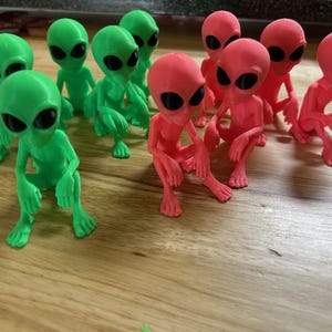 May include: A rustic wooden sign with the text "Welcome to our home" in a handwritten style. The sign is rectangular, with a distressed finish, and features a simple, inviting design. It's suitable for indoor or outdoor use.