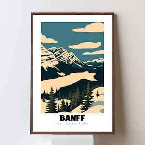 Peut inclure: Une affiche encadrée représentant un paysage stylisé du parc national de Banff. L'œuvre d'art représente des montagnes, un lac et des arbres à feuilles persistantes dans des tons de bleu, de vert et de beige. Le texte "BANFF NATIONAL PARK" est imprimé en bas.