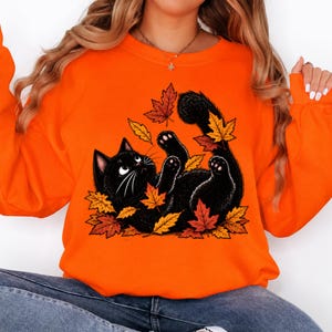 Black Cat Sweatshirt,Fall Crewneck,Retro 90s Autumn Pullover,Halloween Gift,Cozy Feline Graphic,Spooky kitty Leaves,Women’s Seasonal Sweater