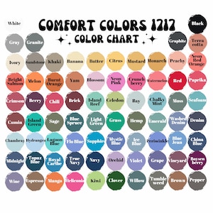 May include: A Comfort Colors 1717 color chart featuring a grid of numerous circular paint swatches in various shades. Each circle is labeled with its corresponding color name, including white, black, gray, granite, ivory, sandstone, khaki, and many others.