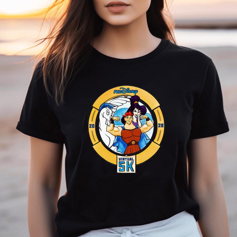 May include: Black t-shirt featuring a circular graphic with the text "runDisney" and "Virtual 5K." The graphic includes cartoon illustrations of Hercules, Megara, and Pegasus. The numbers "20" and "28" are on either side of the graphic.