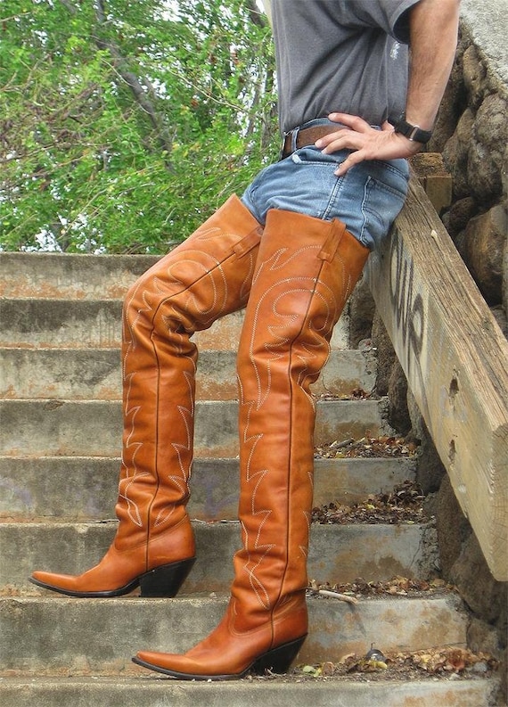 Made to order 37¨ tall round toe cowboy boots made to your leg and foot size . 