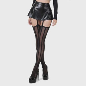 May include: A black faux leather mini skirt paired with black sheer vertical striped tights featuring integrated garter straps. The ensemble is completed with black high-heeled platform pumps, creating a cohesive monochromatic look with distinct textures.
