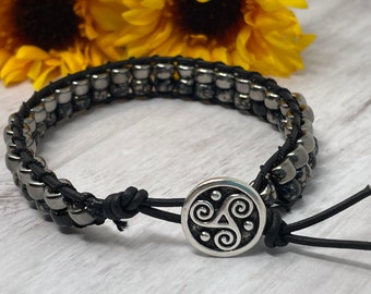 beaded wrap bracelet, triskele button clasp, black and gray, 8 inches, handmade, new