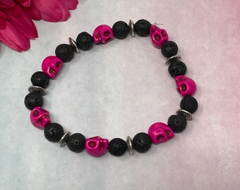 pink and black skull bracelet, pink howlite skull beads, black lava rock beads, stretch bracelet, handmade, new