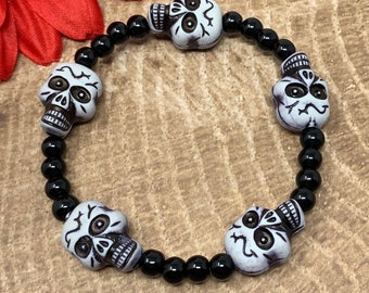 beaded skull bracelet, stretch bracelet, acrylic skull beads, black glass beads, handmade, new