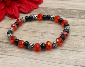 red and black beaded bracelet, red and black glass beads, silver plated spacers, handmade, new