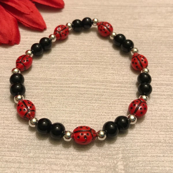 ladybug bracelet, red and black, Czech glass beads, stretch bracelet, handmade, new