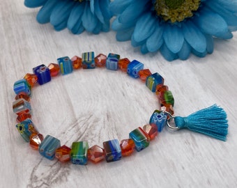 orange and teal bracelet, Swarovski crystal beads, millefiori glass beads, teal tassel, handmade, new