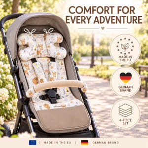 May include: A beige stroller seat liner set featuring a fawn and forest animal print, including a head support pillow, two strap covers, and a seat pad. Text reads: COMFORT FOR EVERY ADVENTURE, MADE IN THE EU, GERMAN BRAND, 4-PIECE SET.