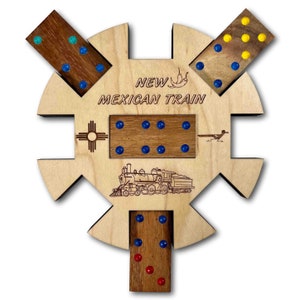 May include: A wooden domino game board with a train design and the text "NEW MEXICAN TRAIN". The board has six slots for dominoes, and there are dominoes in each slot. The dominoes have blue, red, and yellow dots.
