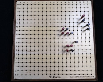 Go Game – Goban - compact and portable style with pegs for stability and ability to move an in-progress game. Pente board also