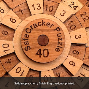 Close detail of the Safecracker 40 in solid maple with a cherry finish and engraved numbers, Creative Crafthouse