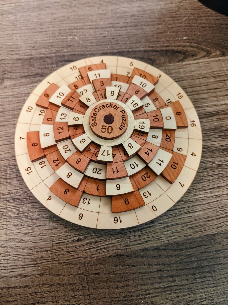 the safecracker 50 wood math brain teasewr is one of the most popular puzzles made by creative crafthouse.