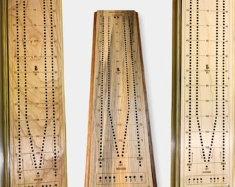 May include: Three wooden game boards with the text "BEETLE KILL PINE" printed on the top. The boards are made of cherry, maple, and pine wood. Each board has a different wood grain pattern. The boards are all the same size and shape. The boards are designed for a game called "Beetle Kill Pine".
