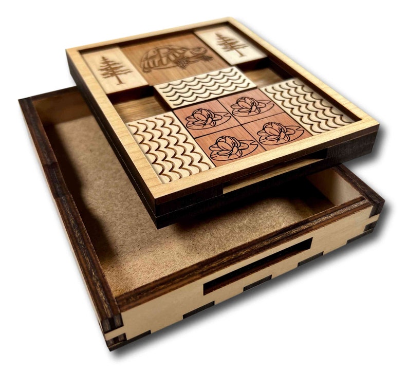The Great Turtle Escape Wooden Sliding Brain Teaser Puzzle. Slide the pieces so that the turtle can escape through the front slot. A fun and difficult challenge! 9 other starting positions of varying difficulty. Made in the USA by Creative Crafthouse